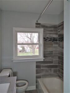 New Luxury Bathroom with tiled shower.